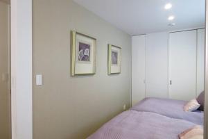 Giường trong phòng chung tại Maizon de Aile Room A
