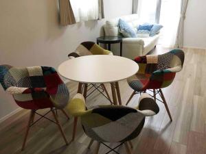 Khu vực ghế ngồi tại Maizon de Aile Room A