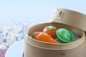 a wooden bucket filled with vegetables on top of a building at ANA Crowne Plaza Kobe, an IHG Hotel in Kobe