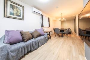 Posezení v ubytování Maizon de Aile Room B
