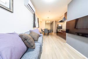 Kuchyň nebo kuchyňský kout v ubytování Maizon de Aile Room B