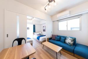 Postel nebo postele na pokoji v ubytování SG RESIDENCE INN HAKATA