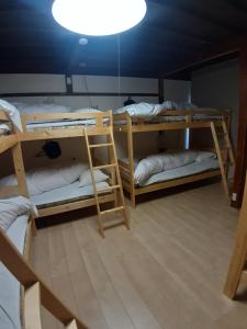 Postel nebo postele na pokoji v ubytování guest house komoriya