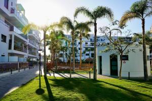 A garden outside Aguacate Beach Apartamentos Playa Granada