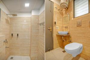 a bathroom with a toilet and a shower at Townhouse in New Delhi