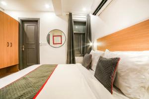 Postel nebo postele na pokoji v ubytování Super Hotel O Nawada Metro + 25 fotografií