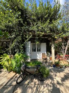 a bike parked in front of a house at Dreamer Cabin Tre house Dalat in Da Thien