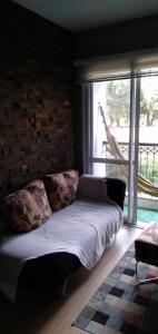 Uma cama ou camas num quarto em Apartamento na Serra Gaúcha