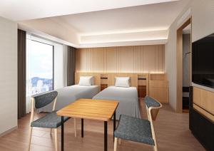TV a/nebo společenská místnost v ubytování HOTEL GRANVIA HIROSHIMA SOUTH GATE + 16 fotografií