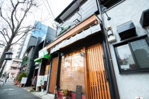 a store front of a building on a city street at Shinagawa-ku - House / Vacation STAY 12126 in Tokyo