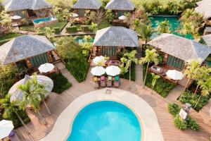 an aerial view of a resort with a swimming pool at Tongna Cottage Natural Resort in Chiang Mai