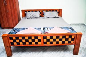 Postel nebo postele na pokoji v ubytování GD Homestay + 4 fotografie