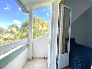 Rõdu või terrass majutusasutuses COLIVER - COLIVING A LA RÉUNION