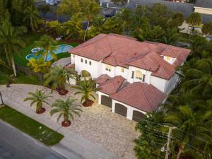 an overhead view of a house with a red roof at 5000 Square Ft Beautiful Mansion w 6br Hot Tub Playground Movie Theater & Game Room in Dania Beach