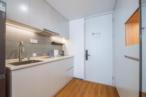 Dapur atau dapur kecil di 上海客堂涧酒店宝山路地铁站店