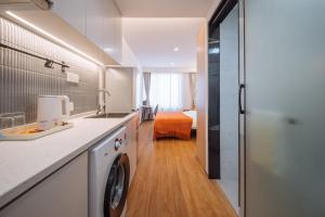 Dapur atau dapur kecil di 上海客堂涧酒店宝山路地铁站店