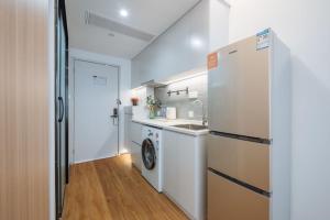 Dapur atau dapur kecil di 上海客堂涧酒店宝山路地铁站店
