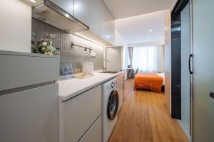 Dapur atau dapur kecil di 上海客堂涧酒店宝山路地铁站店