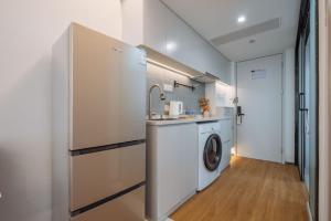 Dapur atau dapur kecil di 上海客堂涧酒店宝山路地铁站店