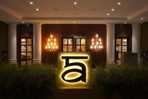 a sign with the number five in a building at The Garden Ananta Elite in Rajkot
