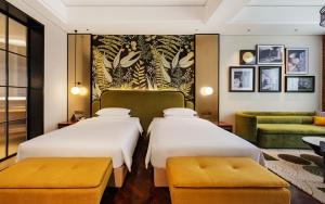 Postel nebo postele na pokoji v ubytování Fondney Hotel Shanghai NECC Hongqiao Airport T2