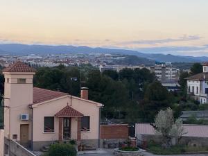 a house with a view of a city at Apartament Sant Jordi in Sant Joan de Vilatorrada