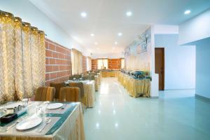 Posezení v ubytování Treebo Galaxy Kings Suites, Hebbal