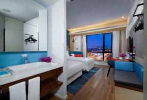 Postel nebo postele na pokoji v ubytování Holiday Inn Express Zhangjiagang East by IHG + 37 fotografií