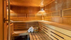 a sauna with two pairs of shoes in it at Apartment Schladming mit Sauna und Pool in Schladming
