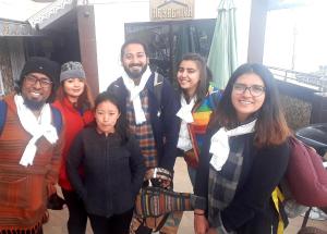 a group of people posing for a picture at Paul's stay in Darjeeling