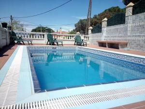 Bazén v ubytování Armonía nebo v jeho okolí