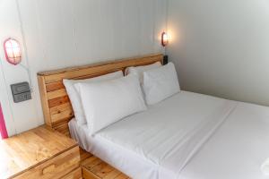 Postel nebo postele na pokoji v ubytování Slumber Resort Koh Chang