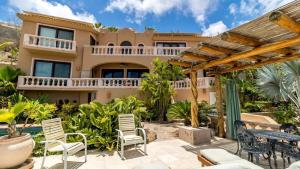 an image of a house with a patio at Easy access to South Palmilla beach in El Bedito