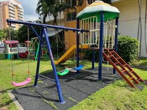 a playground with a slide at Mina view condo 12 in Pattaya South