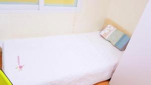 Postelja oz. postelje v sobi nastanitve J-GGV103 close to Jeonbuk University