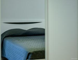 Cama o camas de una habitación en Appart cosy