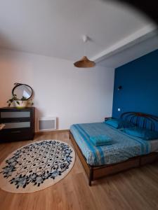 Postel nebo postele na pokoji v ubytování Chez Mary