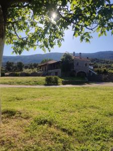 an old house in the middle of a field at Venus cottage in Agios Vlasios +20 photos