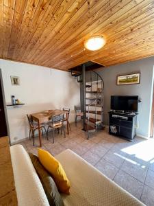 a living room with a couch and a table at Casa Vacanze Marisa in Sesta Godano