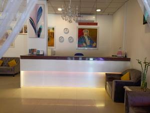 Χώρος καθιστικού στο Savoy Inn Hotel Apartments