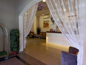 Posezení v ubytování Savoy Inn Hotel Apartments