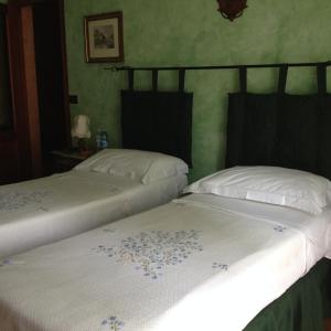 Ein Bett oder Betten in einem Zimmer der Unterkunft Beb Villa Aurora