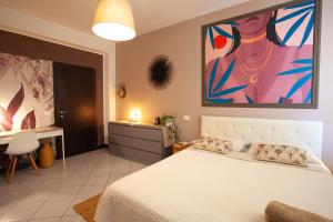 Postel nebo postele na pokoji v ubytování B&B La Volpina