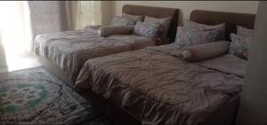 Ένα ή περισσότερα κρεβάτια σε δωμάτιο στο Jeli Heights Hill Homes