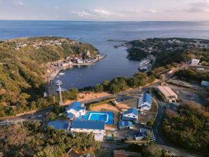 an aerial view of a town and a body of water at Hotel Kailani in Oshima