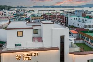 a view of a city from the roof of a building at Browndot Samcheonpo in Sacheon