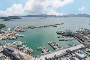 an aerial view of a harbor with boats in the water at Browndot Samcheonpo in Sacheon