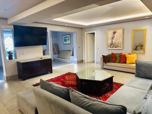 Posezení v ubytování Penthouse cosy avec piscine privée