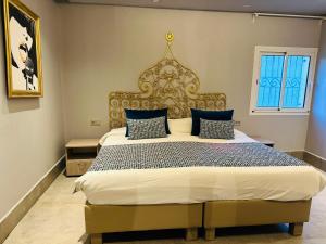 Postel nebo postele na pokoji v ubytování Penthouse cosy avec piscine privée + 23 fotografií