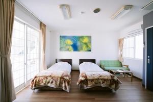 Postel nebo postele na pokoji v ubytování Hotel Kailani + 37 fotografií